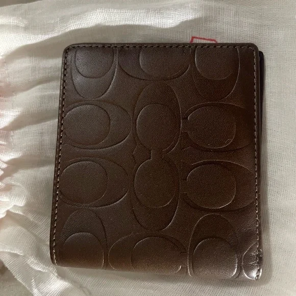 Coach Dark Brown Embossed Leather Wallet